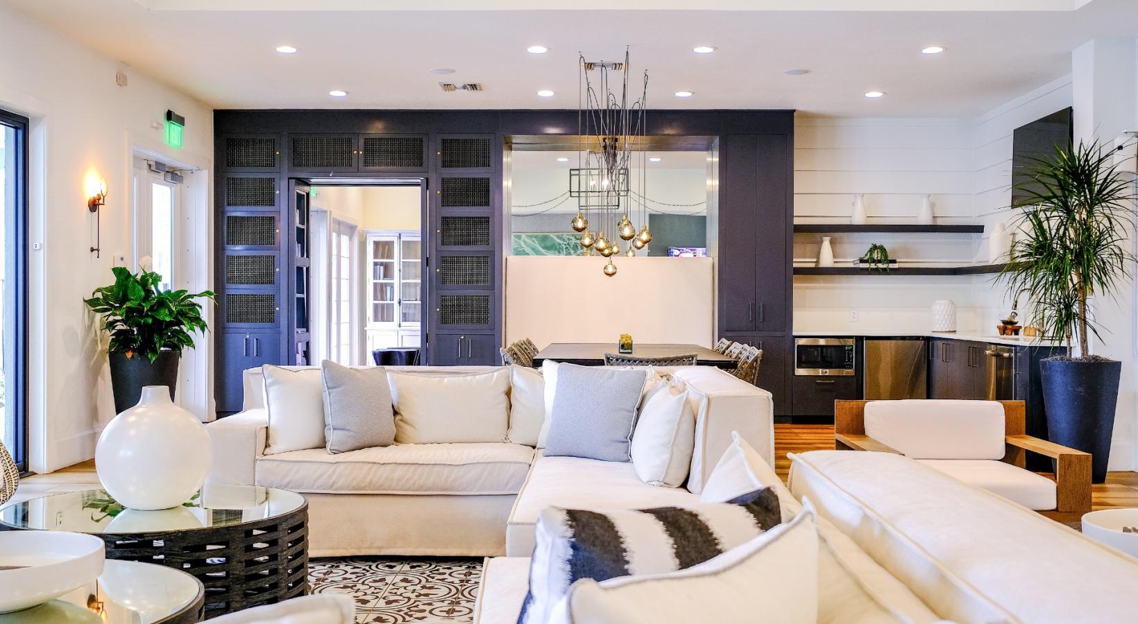 State-of-the-art amenities a clubhouse living room with a fireplace