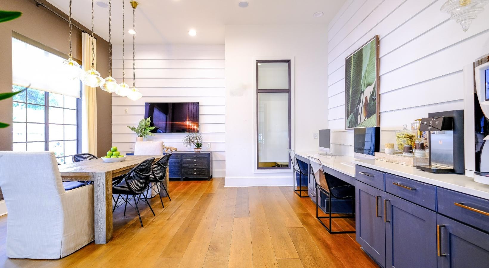 State-of-the-art amenities a large community kitchen with a wood floor