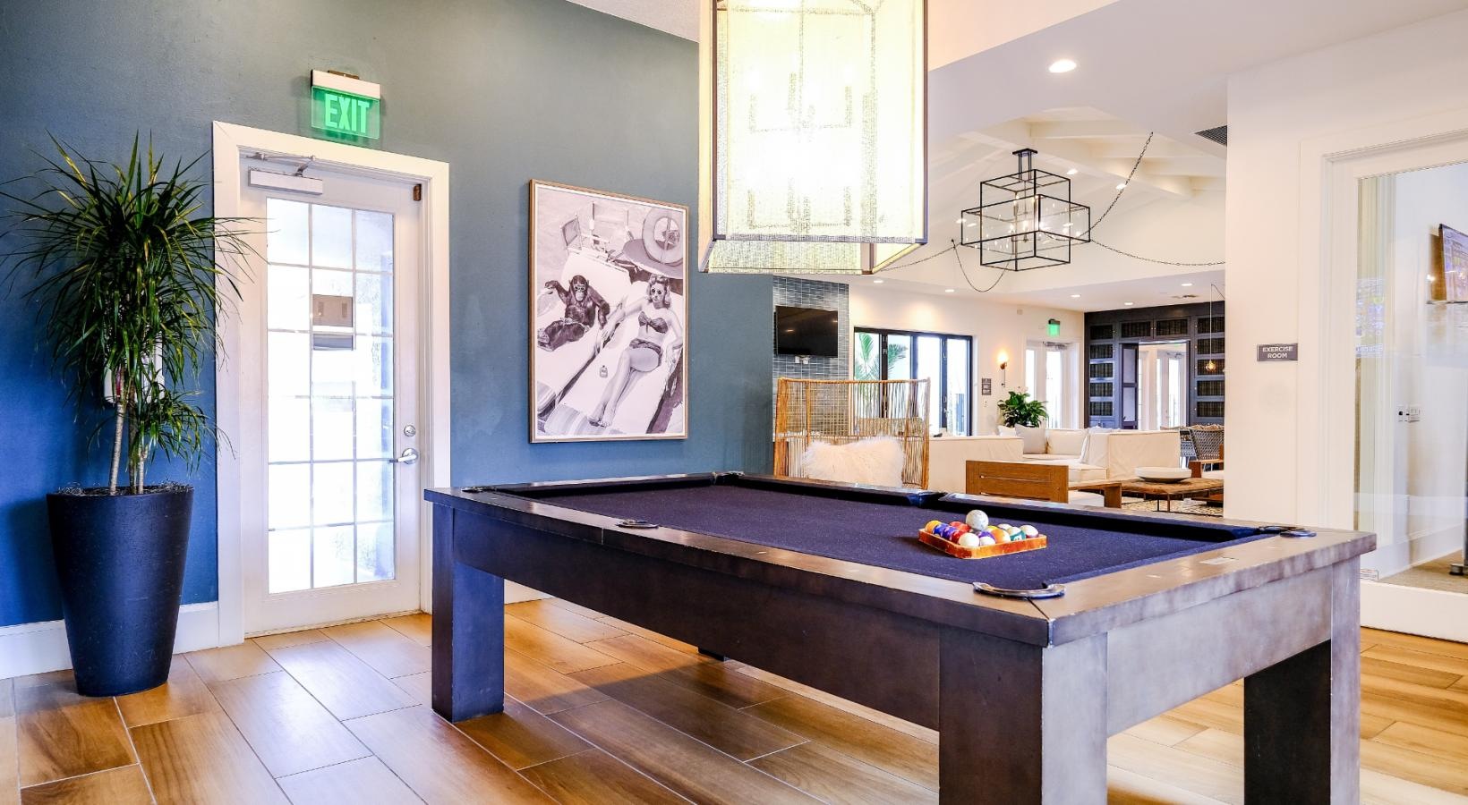 Access to resident-only features a pool table in a room