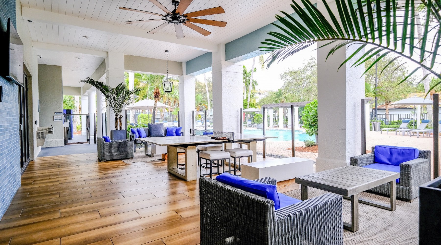 Access to resident only features outdoor patio with seating tv and plants