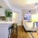 a kitchen with a table and chairs