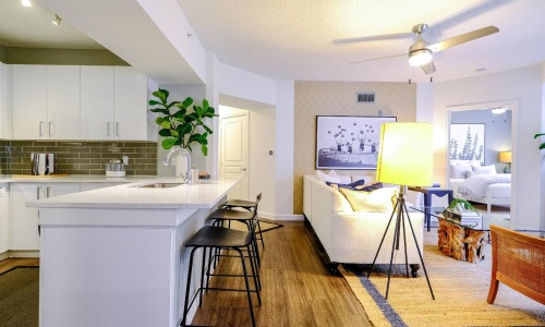 a kitchen with a table and chairs