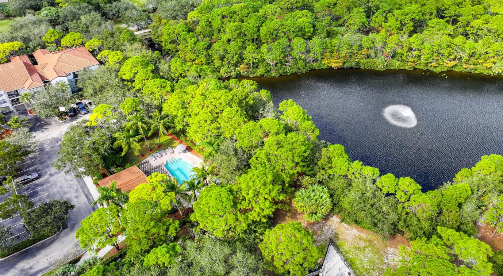 Find your perfect fit at The Sophia at Abacoa a group of houses next to a body of water