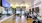 a gym with exercise equipment and a tv