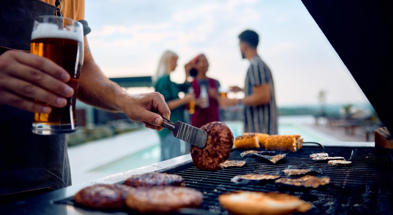 Bustling community with plenty of dining choices a person cooking food on a grill