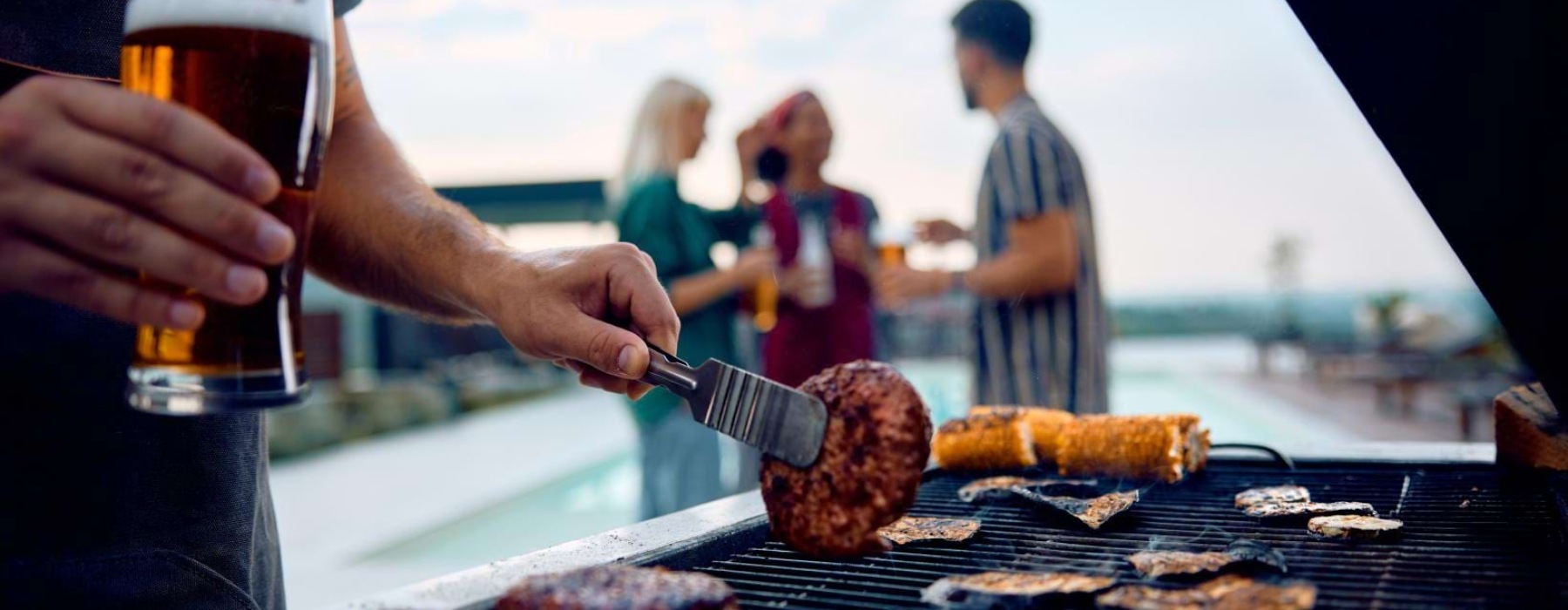a person cooking food on a grill