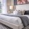 a bed with white pillows