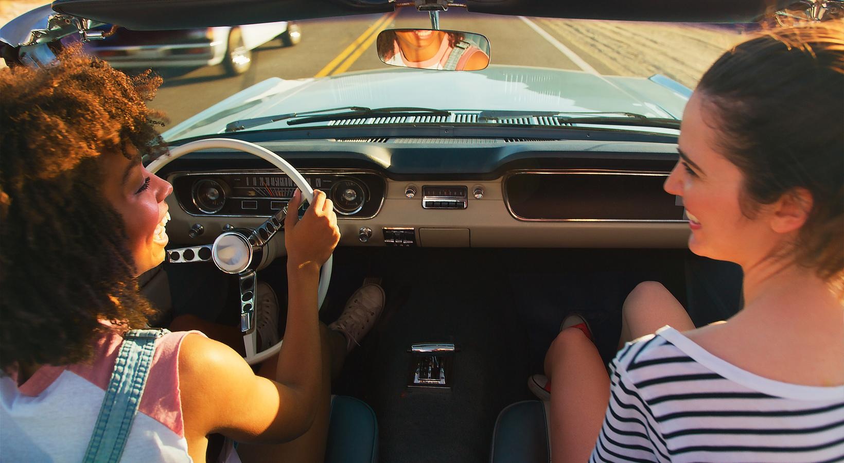 Settle into comfort at The Sophia at Abacoa people driving a car and smiling